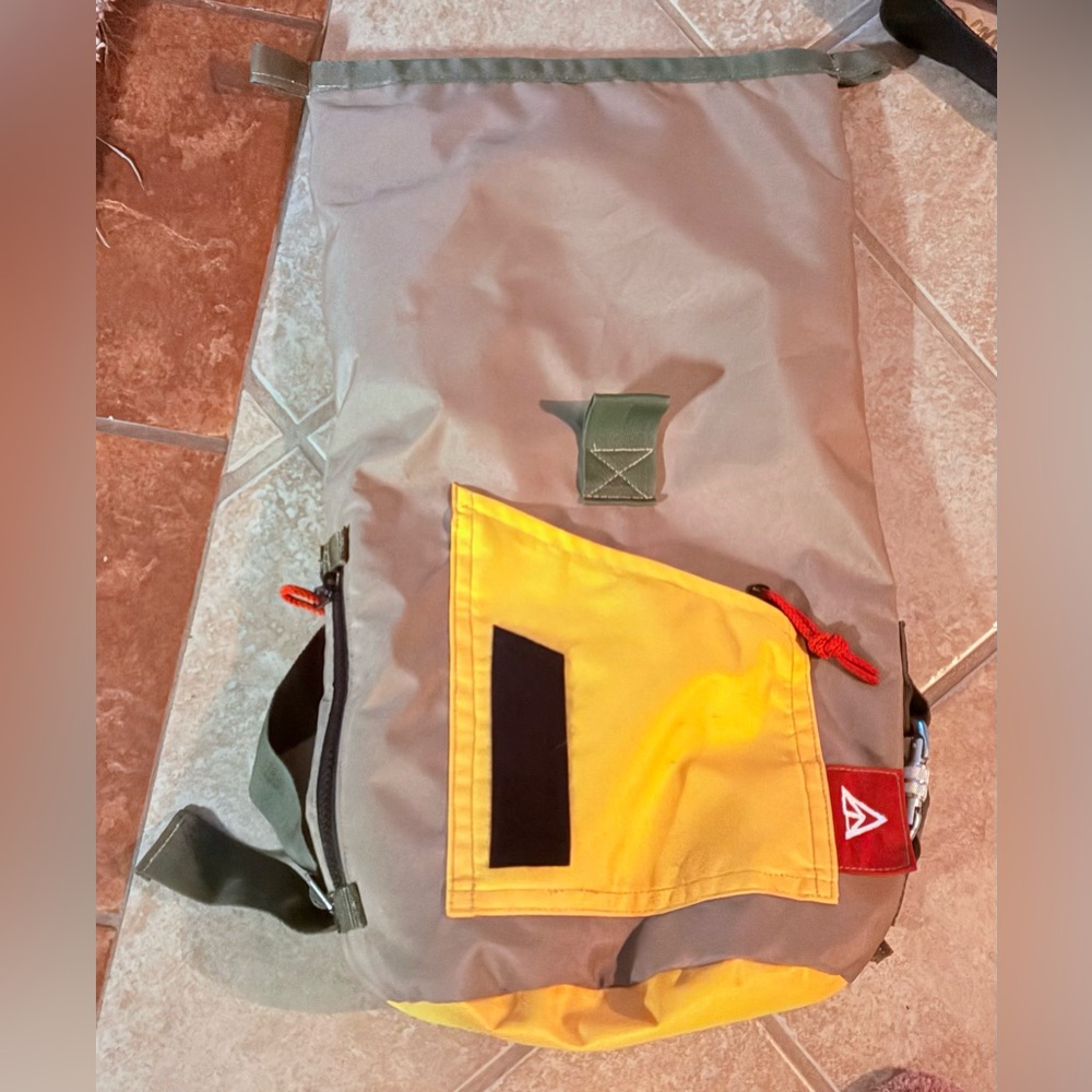 Gray and Yellow dry bag Backpack with Red Accents